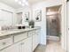 Double vanity bathroom with granite countertop and shower at 3798 Lana Ave, Davenport, FL 33897
