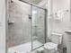 Simple bathroom with a shower and toilet at 3798 Lana Ave, Davenport, FL 33897
