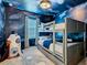 bedroom with a space theme and bunk beds at 3798 Lana Ave, Davenport, FL 33897