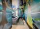 Themed bedroom with twin beds and whimsical mural at 3798 Lana Ave, Davenport, FL 33897
