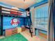 Super Mario themed bedroom with a bunk bed at 3798 Lana Ave, Davenport, FL 33897
