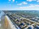 Aerial view of beachfront homes and community at 4411 Sea Mist Ct # 174, New Smyrna Beach, FL 32169