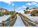 Peaceful walkway to the beach with wooden fencing at 4411 Sea Mist Ct # 174, New Smyrna Beach, FL 32169