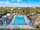 Relaxing community pool with ocean views and lounge chairs at 4411 Sea Mist Ct # 174, New Smyrna Beach, FL 32169