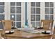 Cozy dining area featuring a round table with a centerpiece at 4411 Sea Mist Ct # 174, New Smyrna Beach, FL 32169