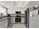 Modern kitchen featuring stainless steel appliances at 4411 Sea Mist Ct # 174, New Smyrna Beach, FL 32169
