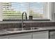 Stainless steel kitchen sink with granite countertop at 4411 Sea Mist Ct # 174, New Smyrna Beach, FL 32169