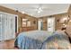 Main bedroom with sliding door to patio and ensuite bathroom at 4411 Sea Mist Ct # 174, New Smyrna Beach, FL 32169