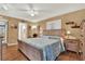 Bright main bedroom with a king-size bed and access to the bathroom at 4411 Sea Mist Ct # 174, New Smyrna Beach, FL 32169