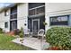 Private patio with seating, great for enjoying the outdoors at 4411 Sea Mist Ct # 174, New Smyrna Beach, FL 32169