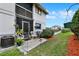 Private patio with seating and landscaping at 4411 Sea Mist Ct # 174, New Smyrna Beach, FL 32169