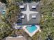 Community pool with lounge chairs at 4411 Sea Mist Ct # 174, New Smyrna Beach, FL 32169