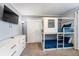 ' bedroom featuring a unique bunk bed and a TV for entertainment at 4800 Memories Ln, Kissimmee, FL 34746