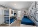 Fun ' bedroom with a bunk bed and a custom mural on the wall at 4800 Memories Ln, Kissimmee, FL 34746
