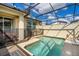 Enclosed pool with a safety fence, comfortable seating, and a sunny atmosphere at 4800 Memories Ln, Kissimmee, FL 34746
