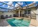 Enclosed pool with a safety fence, lounge chairs, and a sunny atmosphere at 4800 Memories Ln, Kissimmee, FL 34746
