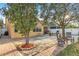 A brick patio with mature trees offers shade in the backyard of this home at 4912 Atwood Dr, Orlando, FL 32828