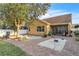 Enjoy the brick patio with sand box, mature trees and proximity to the screened in lanai at 4912 Atwood Dr, Orlando, FL 32828