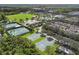 Aerial view of basketball and tennis courts, showcasing recreational amenities amidst lush greenery at 4912 Atwood Dr, Orlando, FL 32828