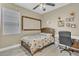 This cozy bedroom is complete with modern decorations, window, and a work space at 4912 Atwood Dr, Orlando, FL 32828