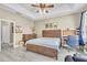 Inviting bedroom with a wooden bed frame, neutral walls, and an open closet with rustic decor at 4912 Atwood Dr, Orlando, FL 32828