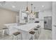 Elegant kitchen featuring a large center island with bar seating, perfect for entertaining at 4912 Atwood Dr, Orlando, FL 32828