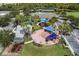 Community playground with shade canopies, swings, and splash pad adjacent to parking at 4912 Atwood Dr, Orlando, FL 32828