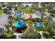 Vibrant playground featuring colorful shade structures, slides, and play equipment amidst landscaped surroundings at 4912 Atwood Dr, Orlando, FL 32828