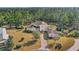 Stunning home with tile roof, driveway, and lush landscaping at 506 Yellow Submarine Ct, Groveland, FL 34737