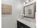 Small bathroom with vanity and a modern mirror at 506 Yellow Submarine Ct, Groveland, FL 34737
