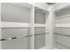 Large walk-in closet with ample hanging space and shelving at 506 Yellow Submarine Ct, Groveland, FL 34737