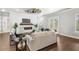 Spacious living room features a fireplace and hardwood floors at 506 Yellow Submarine Ct, Groveland, FL 34737