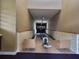 Private bowling alley inside the community featuring seating, and an automatic ball return system at 5518 Metrowest Blvd # 104, Orlando, FL 32811