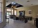 Relaxing clubhouse with a lounge area, television, comfortable seating, and a stylish ceiling fan at 5518 Metrowest Blvd # 104, Orlando, FL 32811