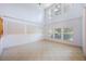 Living room features high ceilings, large windows and abundant natural light at 7189 Regina Way, Orlando, FL 32819