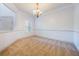 The home features new carpet, classic paint, and a chandelier at 7189 Regina Way, Orlando, FL 32819