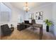 Bright home office featuring a large desk, comfortable chair, and natural light at 7189 Regina Way, Orlando, FL 32819