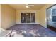 An empty brick paved patio perfect for sitting and relaxing at 7189 Regina Way, Orlando, FL 32819