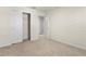 Bedroom with neutral carpet and closet at 7343 Oakmoss Loop, Davenport, FL 33837