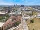 High aerial view showing an apartment complex close to an interchange with city buildings in the background at 911 N Orange Ave # 352, Orlando, FL 32801