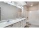 Clean bathroom featuring double sinks and a shower-tub combination at 911 N Orange Ave # 352, Orlando, FL 32801