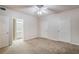 A neutral bedroom is spacious and leads to a bathroom, with two door access in the room at 911 N Orange Ave # 352, Orlando, FL 32801