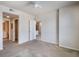 Neutral bedroom featuring a ceiling fan with a view to the bathroom and kitchen at 911 N Orange Ave # 352, Orlando, FL 32801