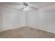Bright bedroom features a ceiling fan and a view of dual closets at 911 N Orange Ave # 352, Orlando, FL 32801