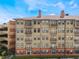 Facade of an apartment building with balconies and consistent window design for uniform look at 911 N Orange Ave # 352, Orlando, FL 32801