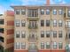 Exterior of an apartment building with balconies and multiple windows, highlighting the facade design at 911 N Orange Ave # 352, Orlando, FL 32801