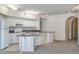 Well-lit kitchen showcases white cabinets, granite countertops, and modern appliances at 911 N Orange Ave # 352, Orlando, FL 32801