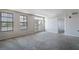Spacious living room with carpet and natural light with a view to the balcony at 911 N Orange Ave # 352, Orlando, FL 32801
