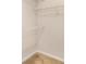 A convenient walk-in closet is equipped with wire shelving for clothing and personal item storage at 911 N Orange Ave # 352, Orlando, FL 32801