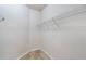 A bright empty walk-in closet has wire shelving for storing personal belongings and staying organized at 911 N Orange Ave # 352, Orlando, FL 32801